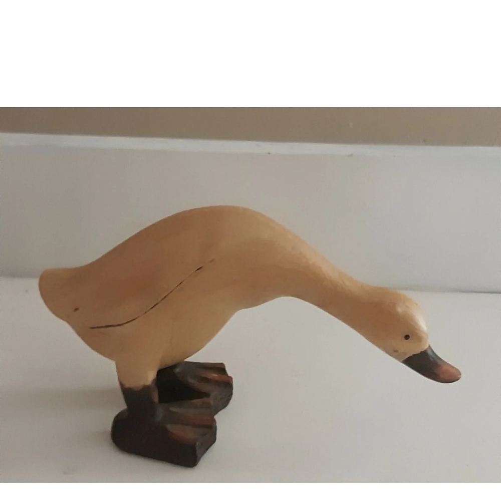 Wood duck figurine 5X8 inches, beige and Brown